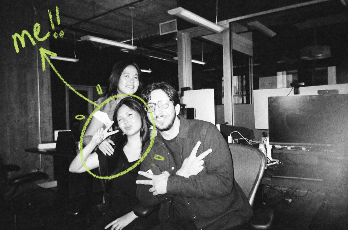 Mai with two coworkers at the office, circled in green with a hand-drawn arrow and the word me